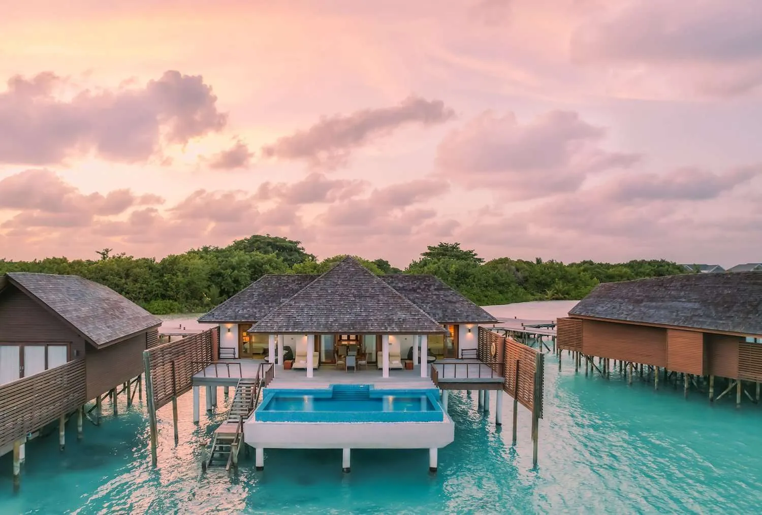 - 330 Sqm
- Discover elevated luxury in our two-bedroom Ocean Villas, perched on wooden stilts in the tranquil lagoon. Perfect for families or friends, each bedroom features its own sitting area and private indoor bathroom. The spacious living room boasts a dining table and opens onto a vast deck with a private pool, offering breathtaking views. Experience ultimate comfort and shared moments in this idyllic retreat.