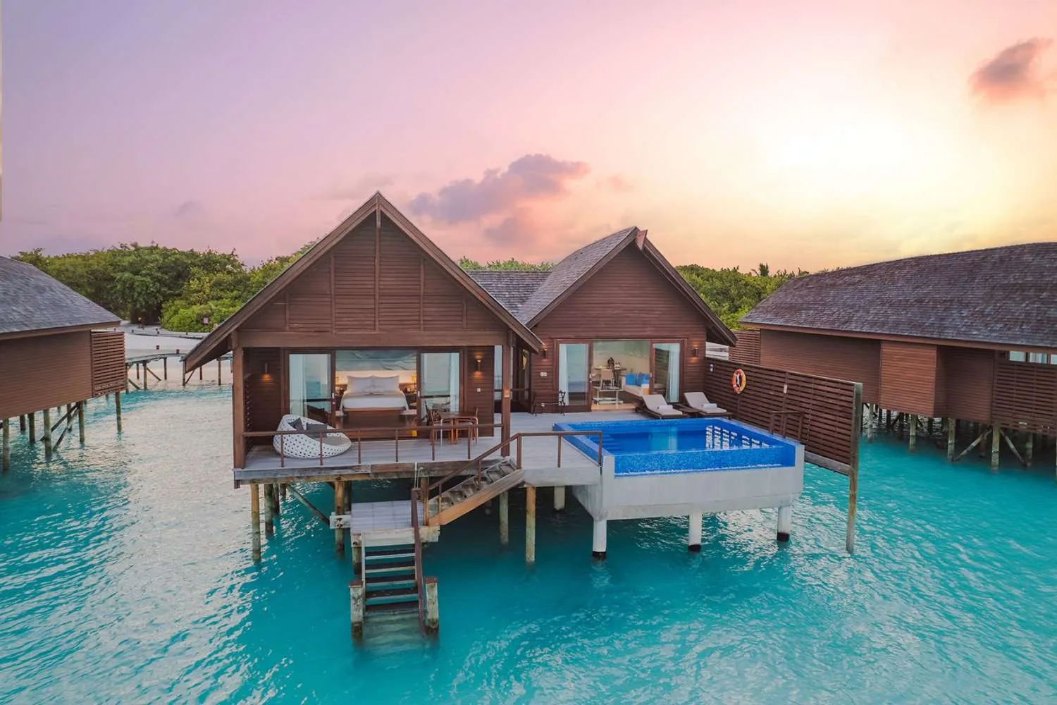 - 290 Sqm
- Elevate your romantic escape in our fabulous Ocean Villa with Pool, perched on stilts above the ocean. Perfect for honeymooners, these villas exude elegant living with a unique glass-floored living room, a separate dining area, a vast open-plan bedroom, and a private pool on the deck that overlooks the endless turquoise waters.
