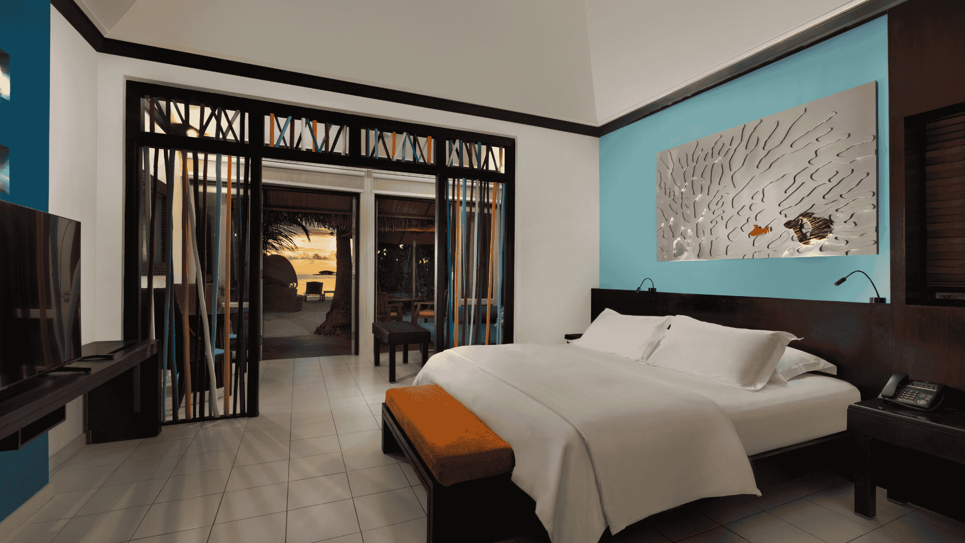 - 57 sqm / 613 sqft
- King beds
- View Rooms Oceanfront
- 24 hours check-in and check-out
- Coffee and Tea Making Facilities
- Complimentary Wi-Fi
- In-Room Safe
- Minibar
- Outdoor Shower
- Smart TV