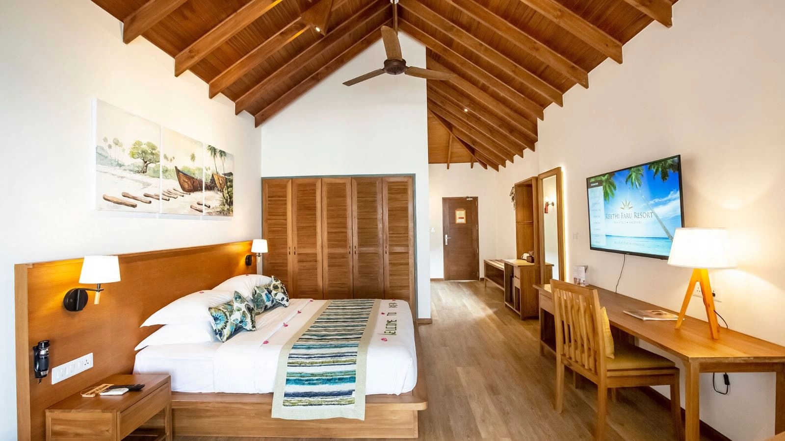 - The truly private setting of this beach villa in the Maldives invites you to slow down and embrace the simple pleasures of island living. With uninterrupted sea views and direct access to soft, untouched sands, the villa opens onto a sunset cabana, sun loungers and cosy reading chairs - perfect for unhurried moments by the shore. Thoughtfully designed across 74 sq m and ideal for up to 3 guests, it offers both space and seclusion.Inside, a plush king size bed, air conditioning with a ceiling fan and a refreshing rain shower ensure complete comfort, while amenities such as a mini bar, tea and coffee facilities, satellite TV, WiFi and an in-room safe add effortless convenience.